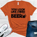 You Look Like I Need Another Beer Graphic Tee product image 1